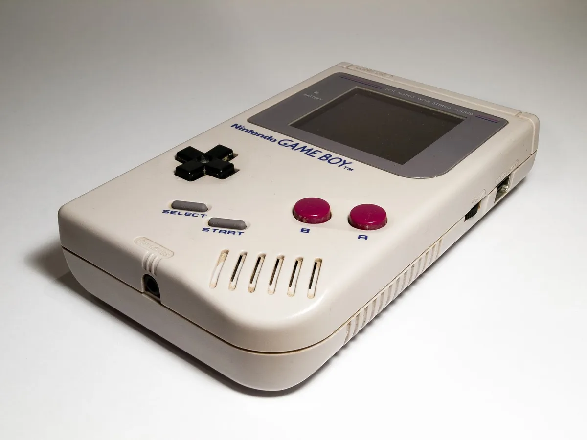 Collection of vintage Nintendo Game Boy games and console