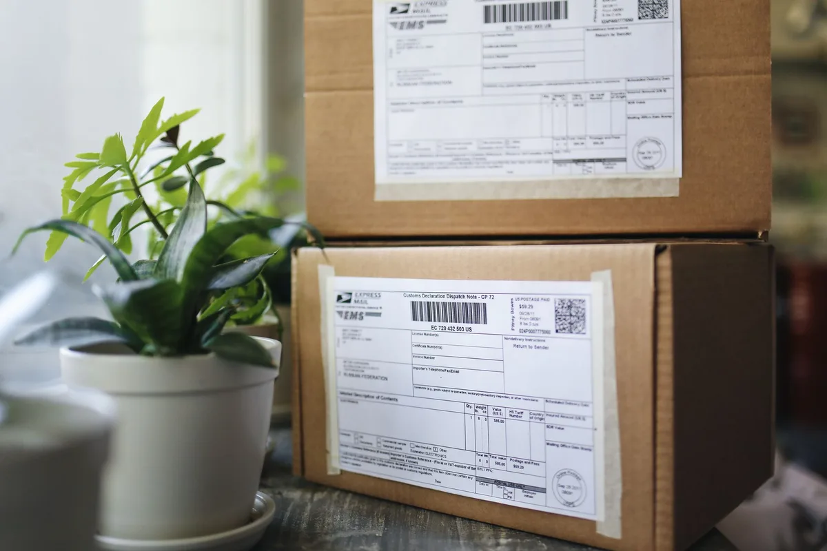 Thermal shipping label printer with printed labels