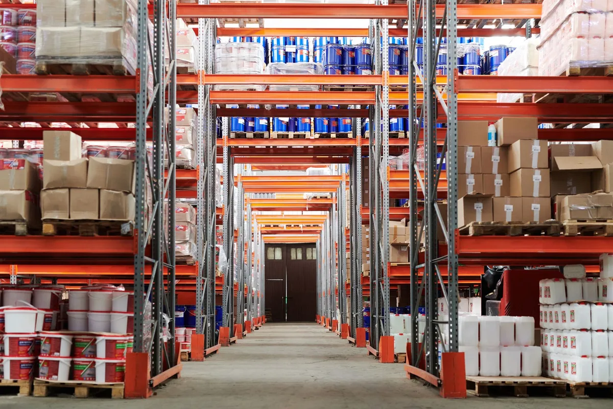 Organized shelving with boxes and bins in a clean storage space