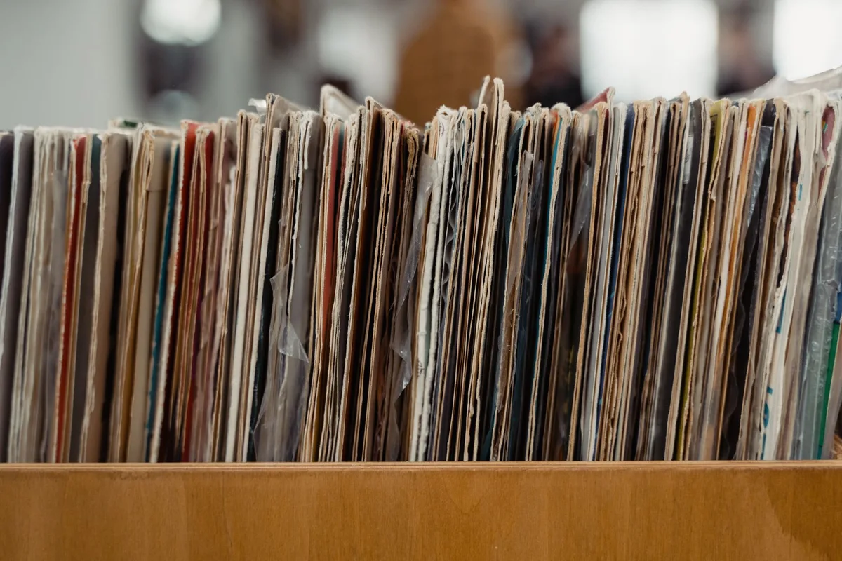 Collection of vintage vinyl records displayed for resale