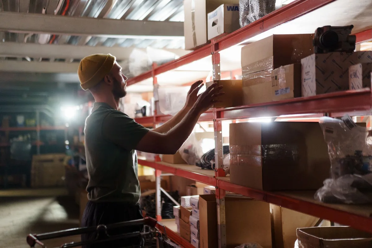 Neatly organized clothing inventory on shelves and racks