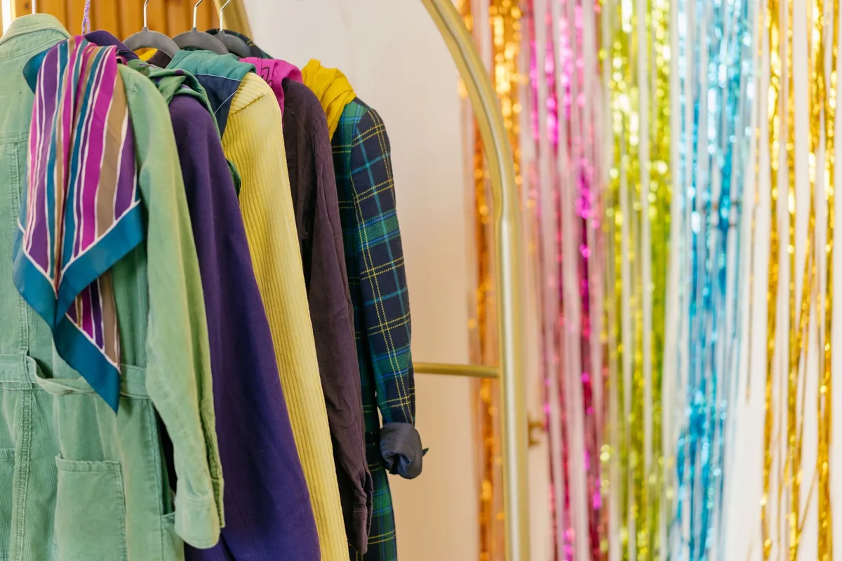 Vintage wool coat hanging on clothing rack